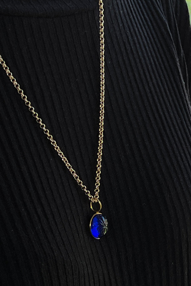 Carved Blue Glass Flower Pendant Necklace